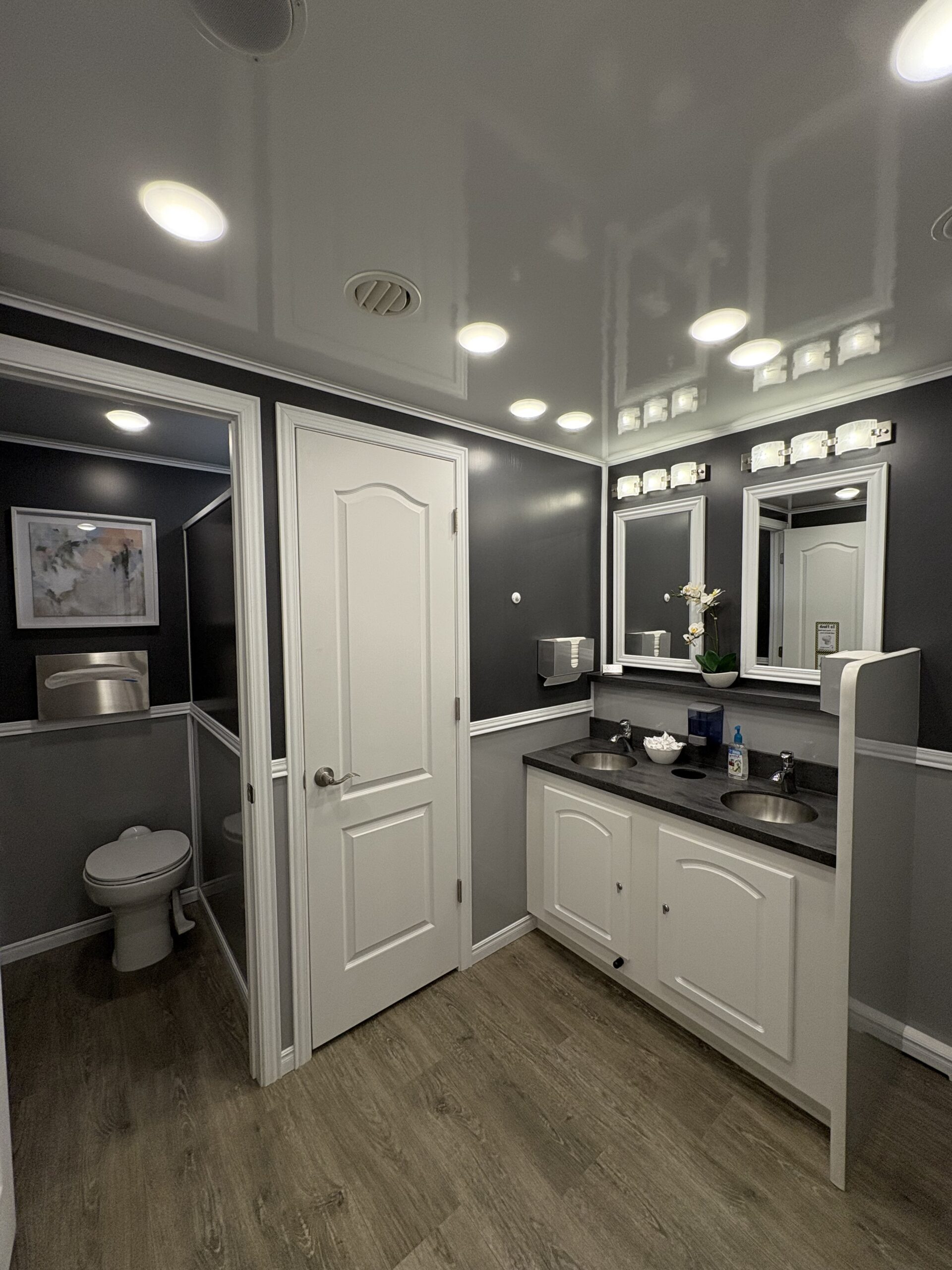 Ten Stall Cottage interior — bright, elegant vanity and stalls — Royal Restrooms of California