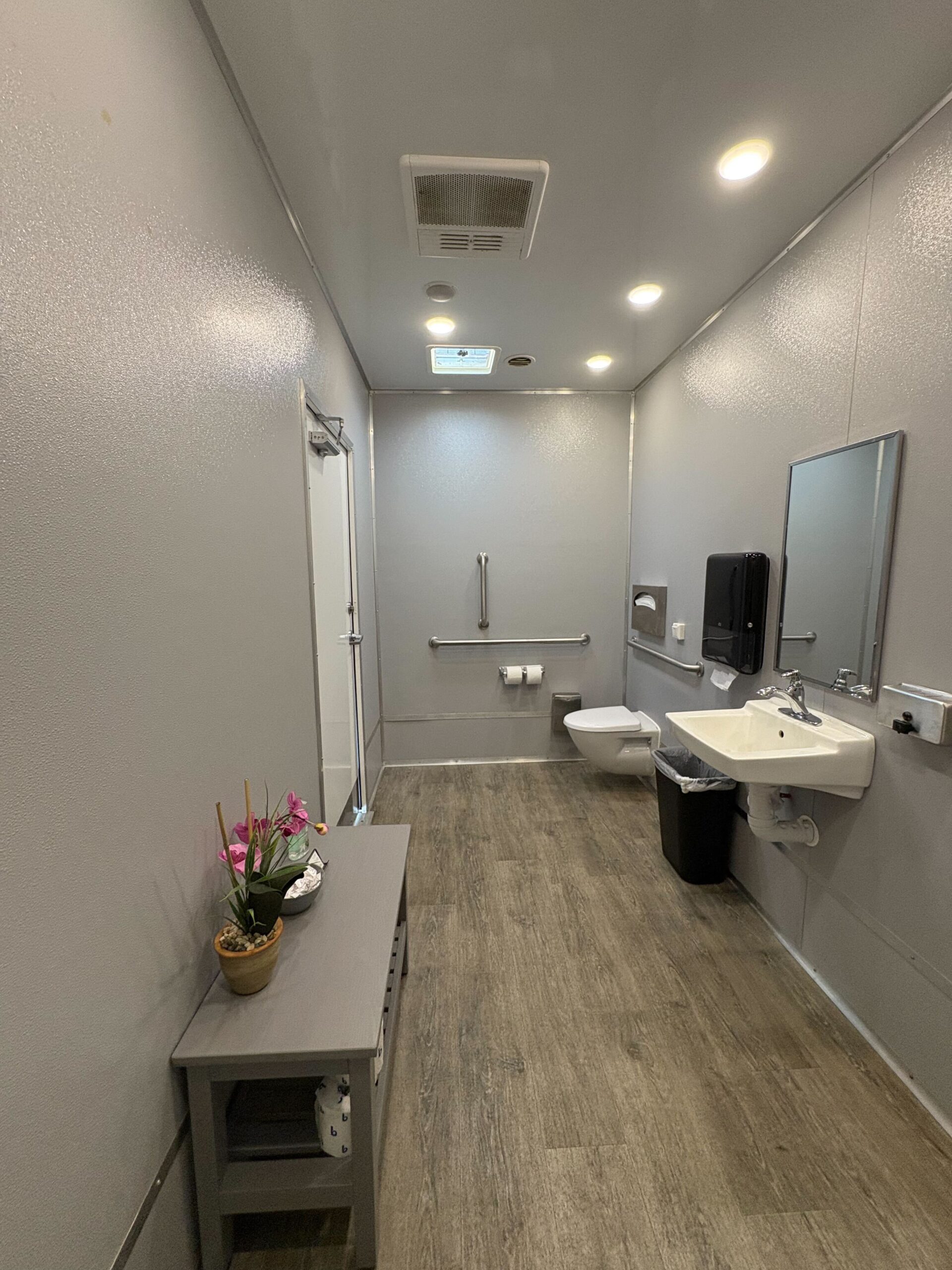 ADA + 2 Stall with ADA Shower trailer — interior overview