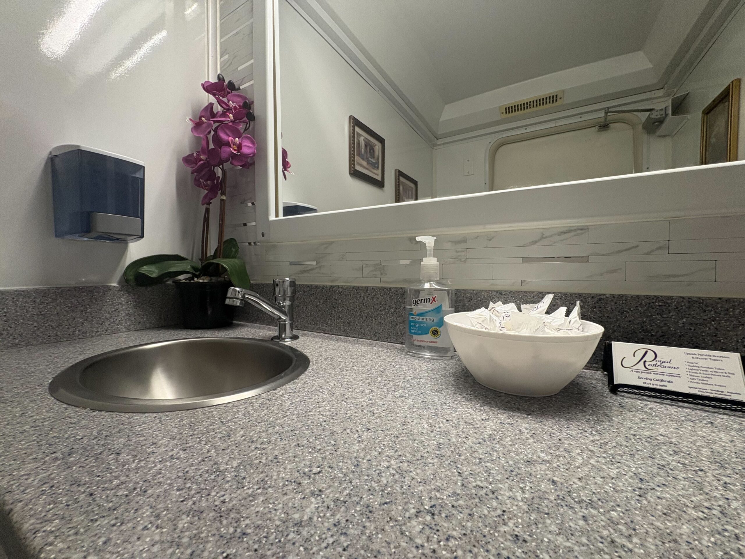 Two Stall restroom trailer interior vanity with orchid