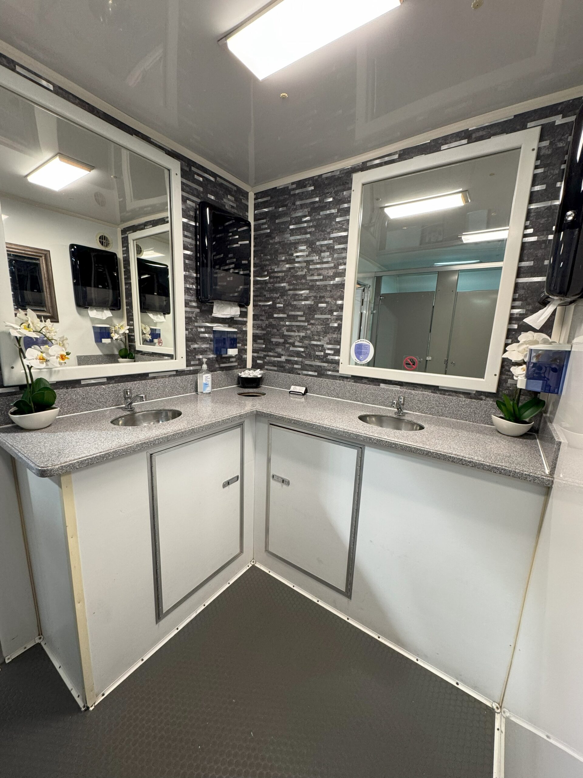Ten Stall restroom trailer interior vanity and mirrors
