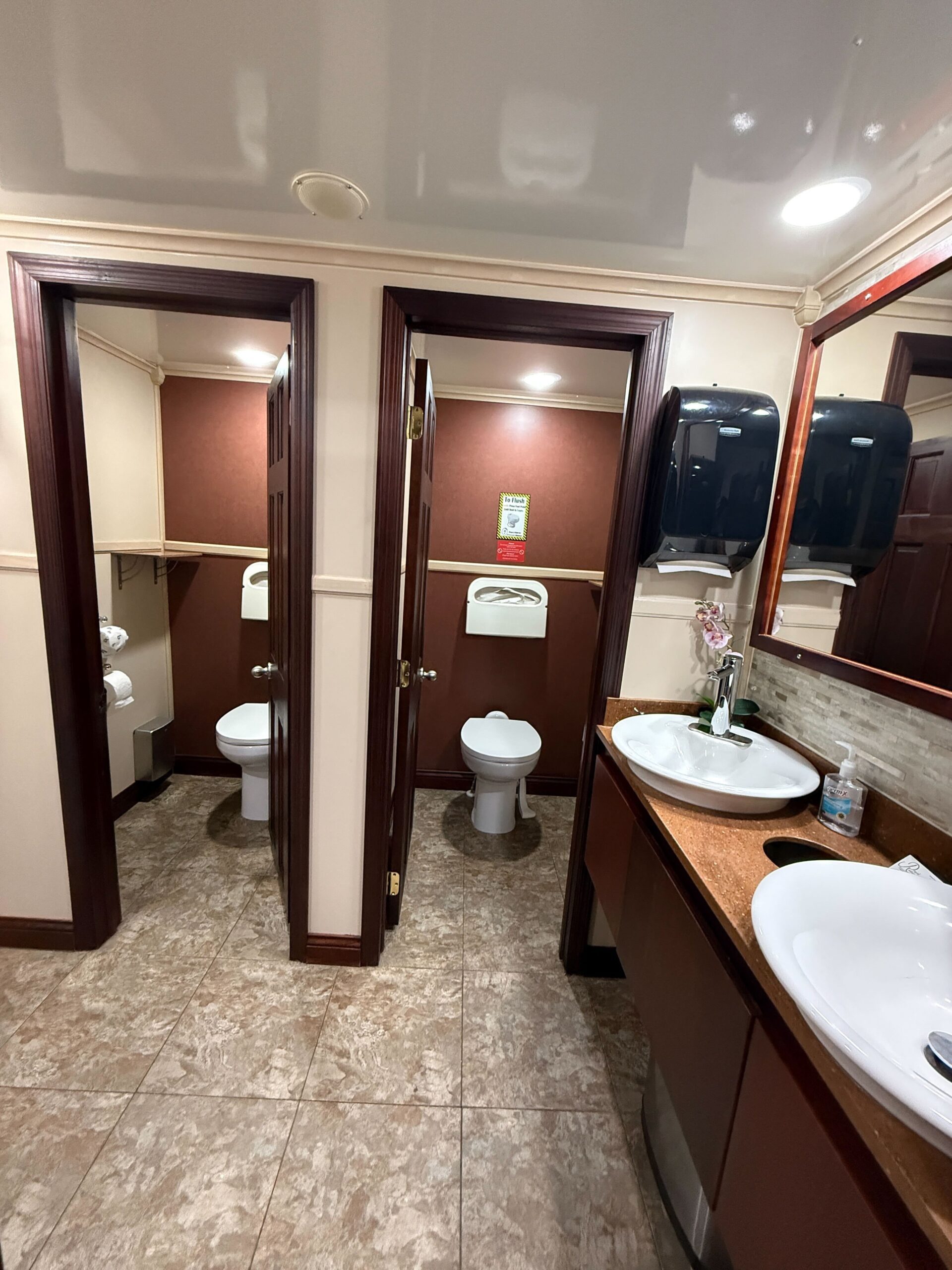 Signature Ten Stall restroom trailer at premium event setting