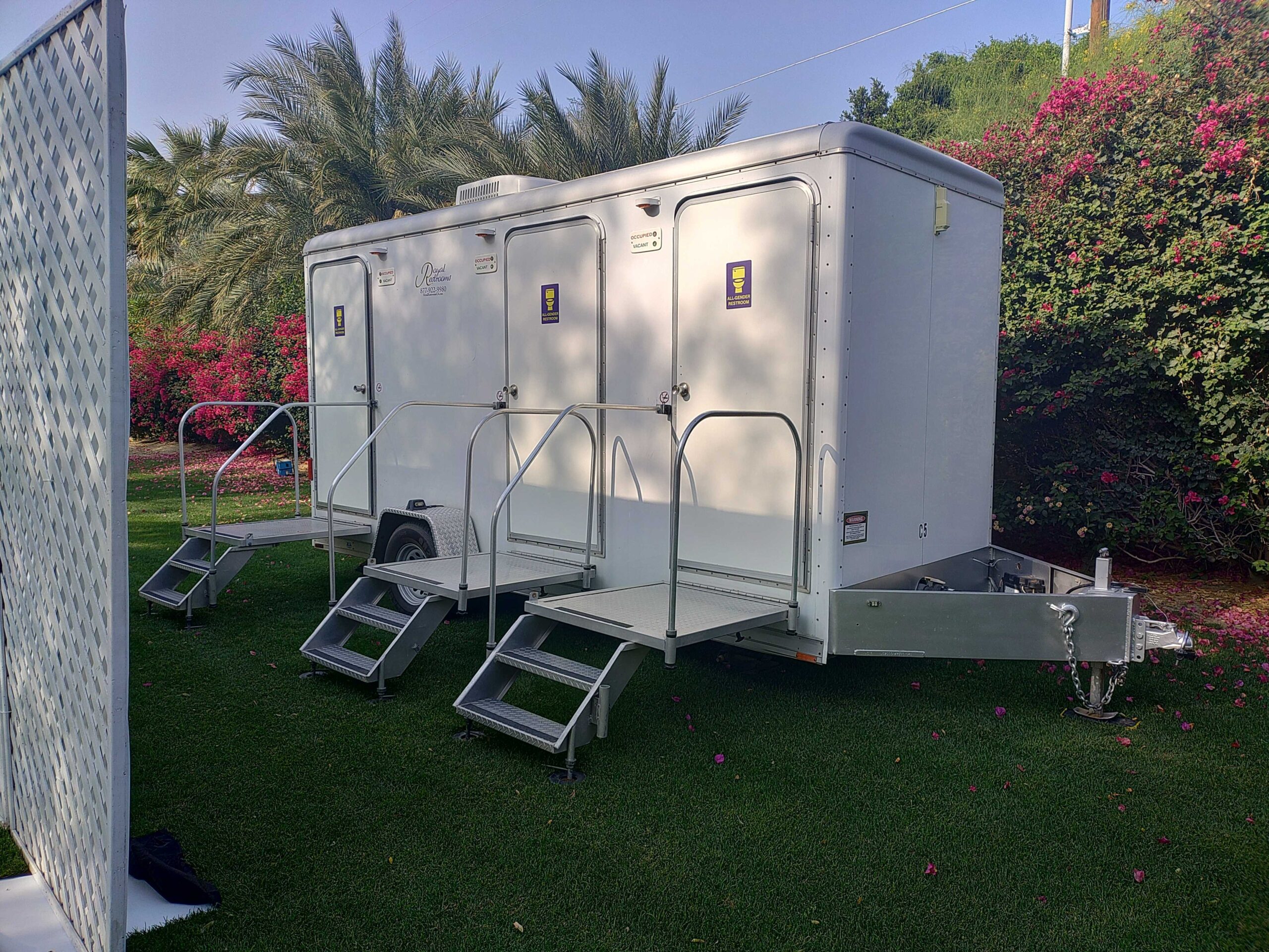 Three Stall restroom trailer exterior in event setting