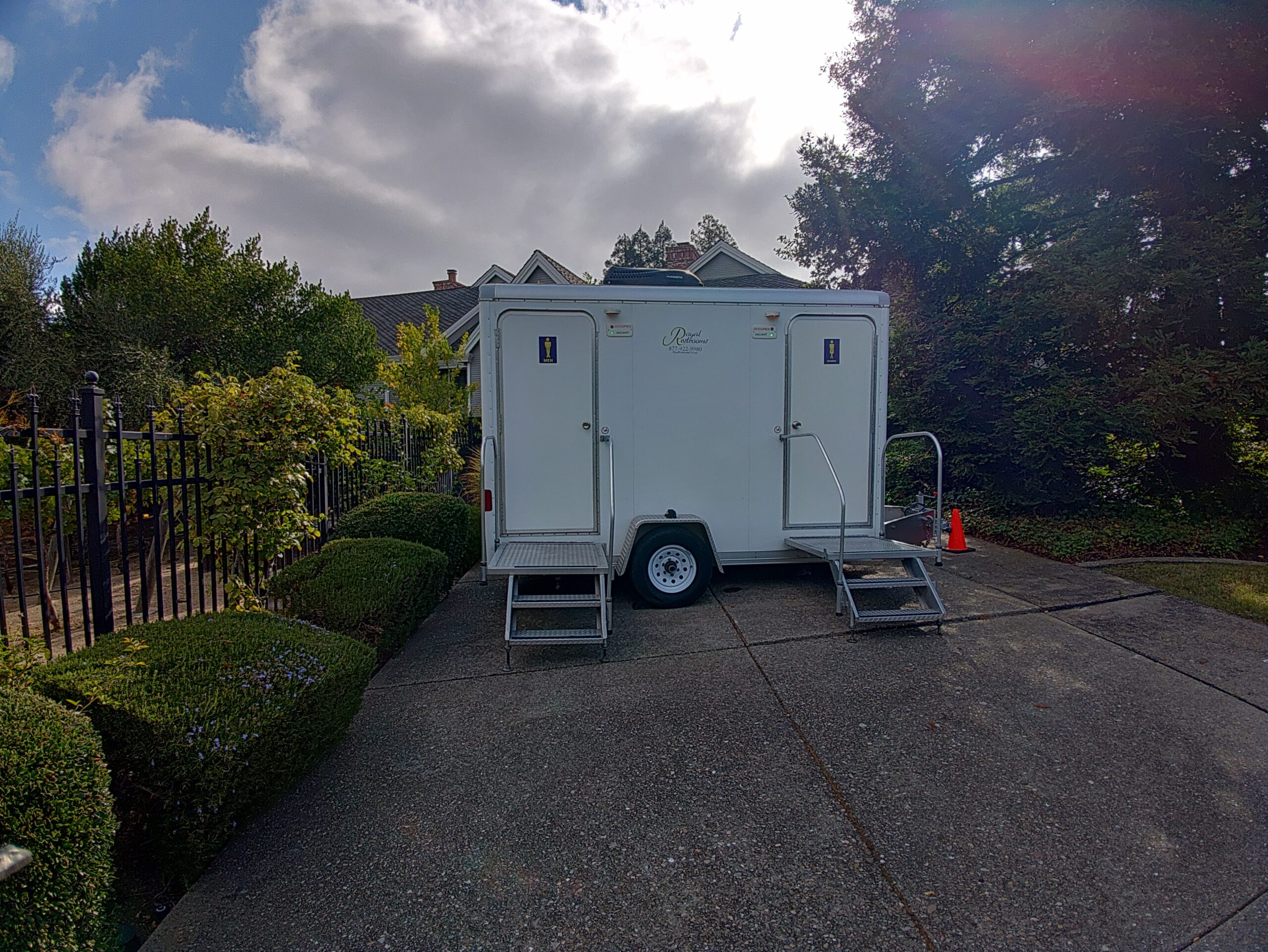 Restroom trailer exterior in wooded area